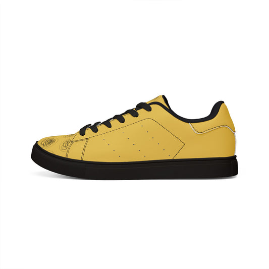 Yellow sneaker with black accents on a white background