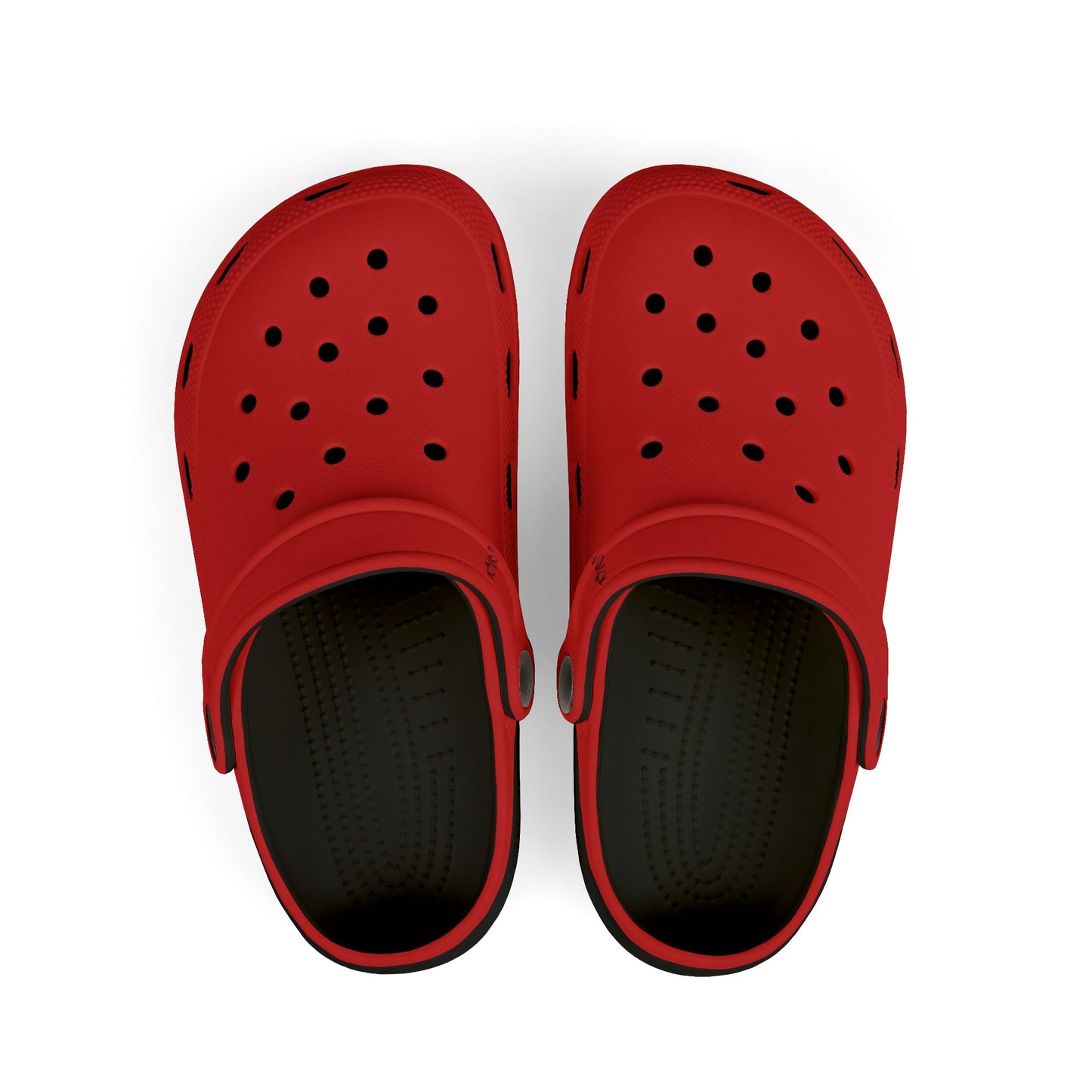 Red clogs with black soles on a white background