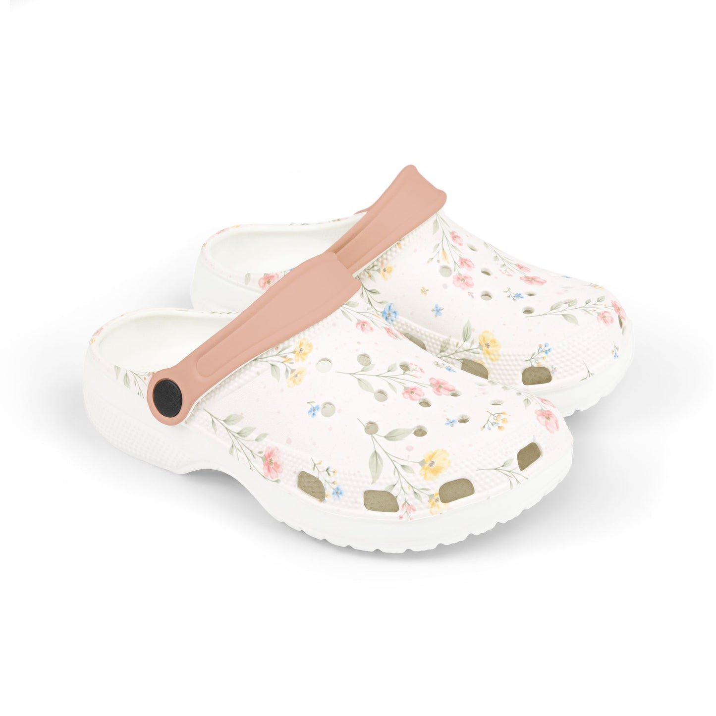 Floral-patterned clogs with a pink strap on a white background