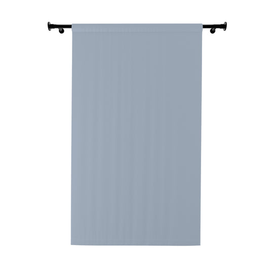 Green patterned curtain on a white background