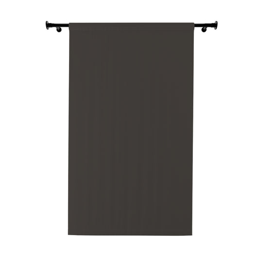 Dark gray curtain hanging on a rod against a white background