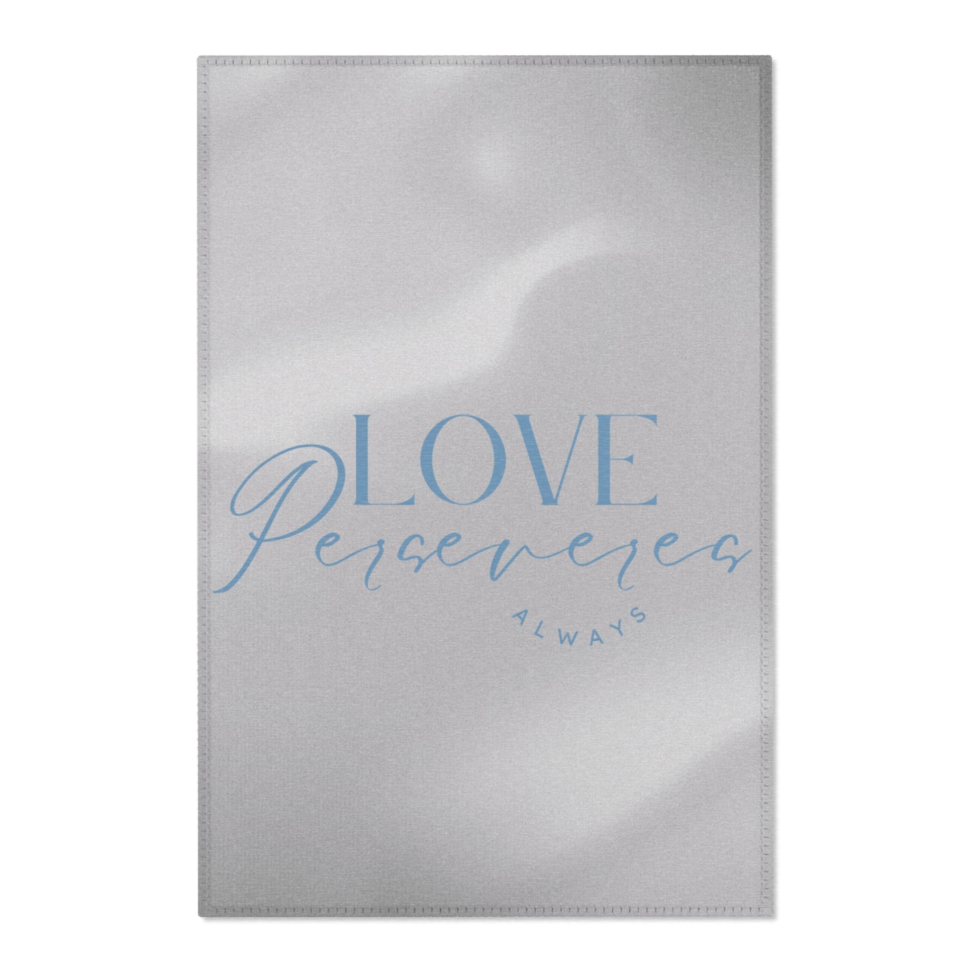 Silver foil card with 'Love Perseveres Always' text