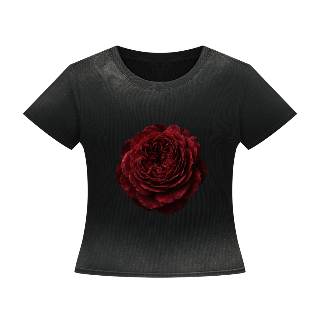 A black short-sleeve crop top t-shirt featuring a large, detailed red rose graphic printed on the center chest, displayed against a solid white background.