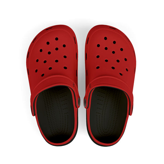 Red clogs with black soles on a white background