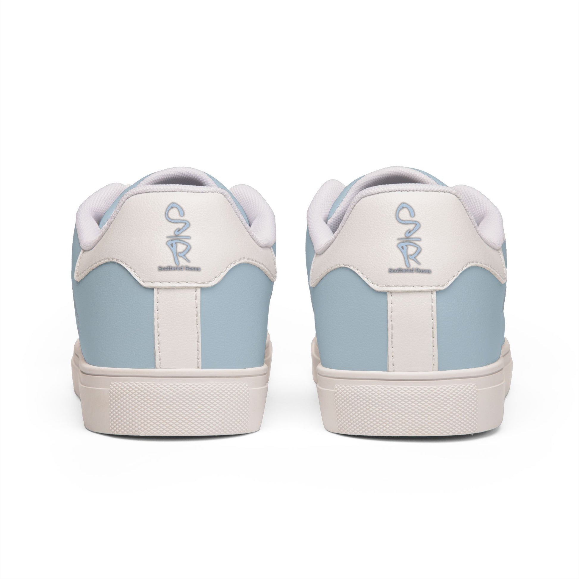 Light blue and white sneakers with a brand logo on a white background