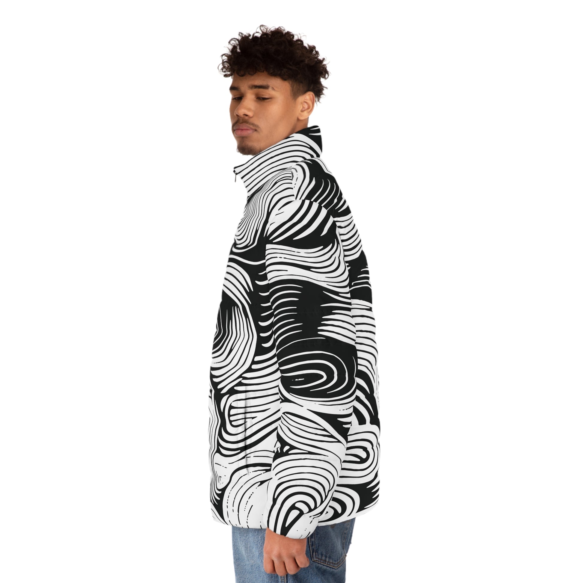 Person wearing a black and white patterned jacket on a white background